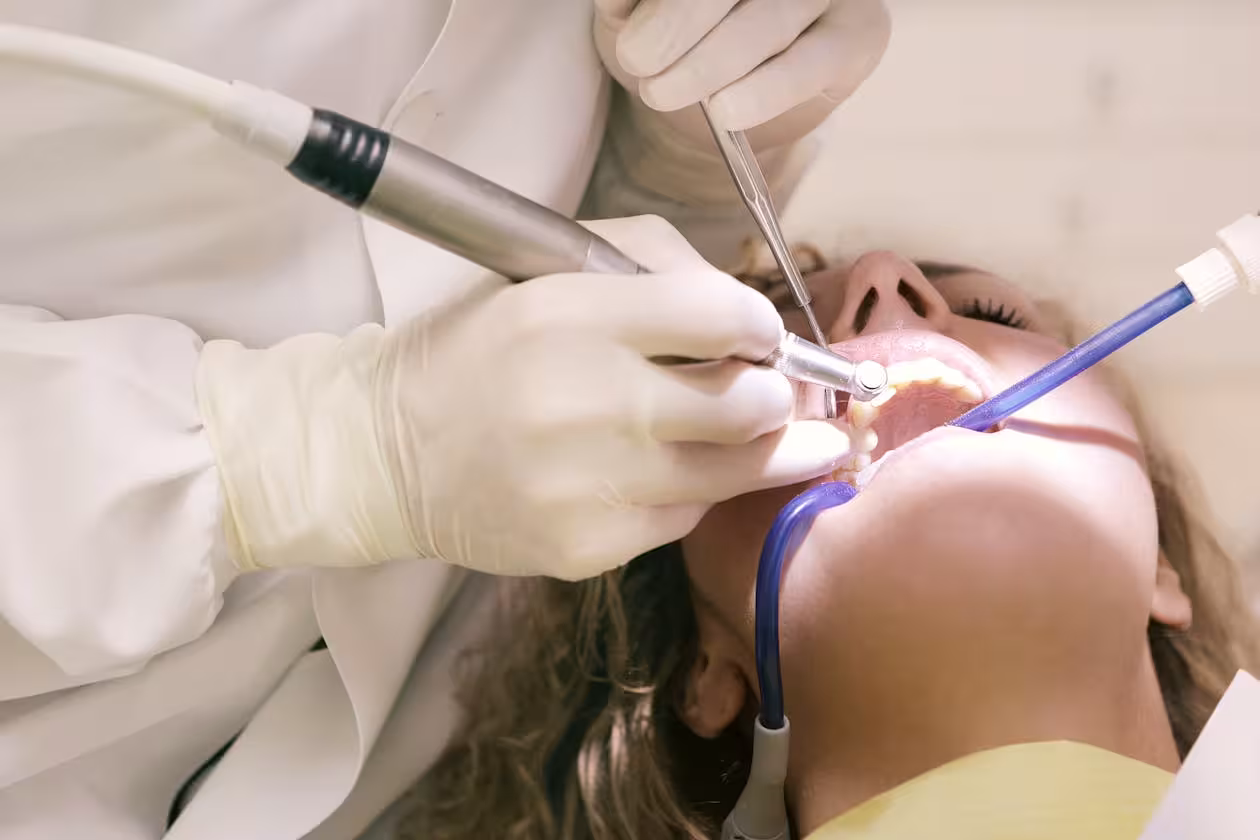 Dentist performing root canal treatment at Empire Dental Clinic Dublin